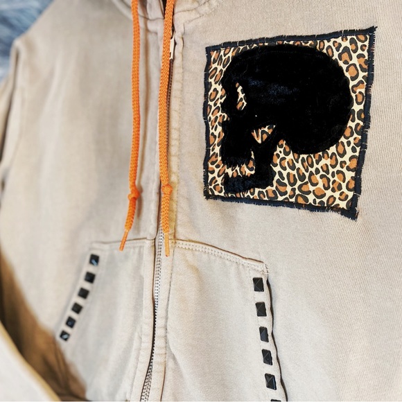 Beige distressed crop hoodie with custom designed skull patch. - Picture 2 of 4